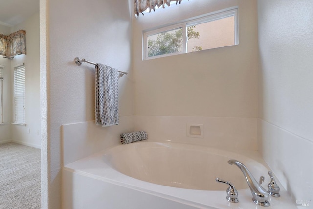full bath with a garden tub