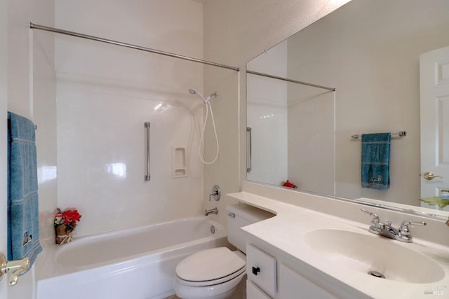 full bathroom with toilet, vanity, and  shower combination
