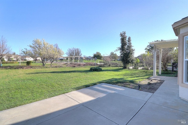 view of yard featuring a patio and a pergola