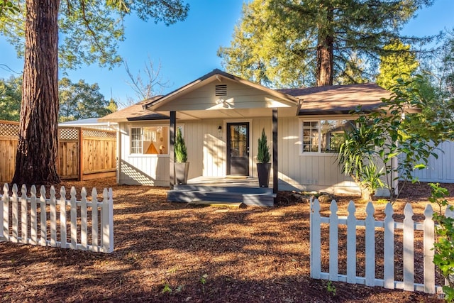 ranch-style home with fence private yard