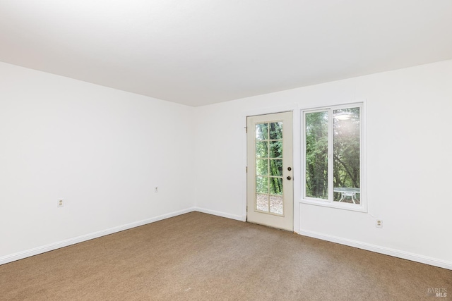 view of carpeted spare room