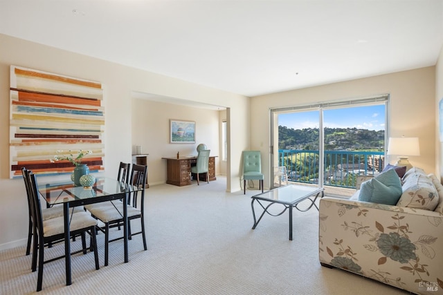 living room with light colored carpet