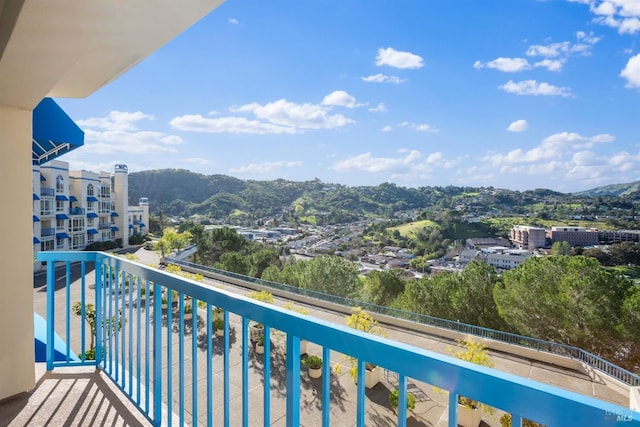 balcony featuring a mountain view