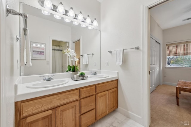 bathroom featuring vanity