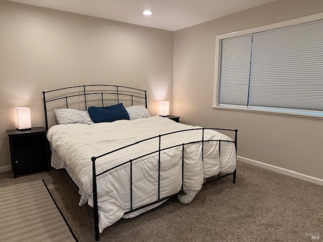 carpeted bedroom with recessed lighting and baseboards