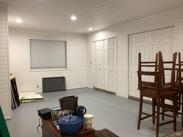 interior space featuring recessed lighting and finished concrete floors