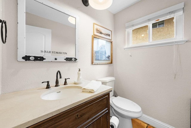 half bath with toilet and vanity