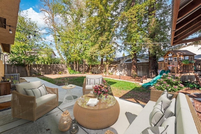 view of patio / terrace with a fenced backyard and outdoor lounge area