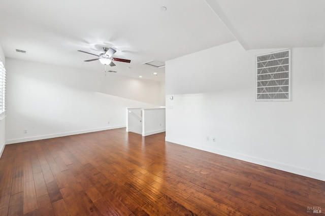 unfurnished room featuring ceiling fan and dark hardwood / wood-style floors