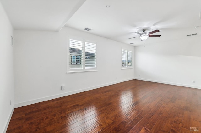 spare room with wood-type flooring and ceiling fan