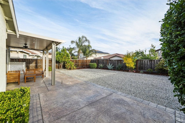 view of patio / terrace featuring ceiling fan