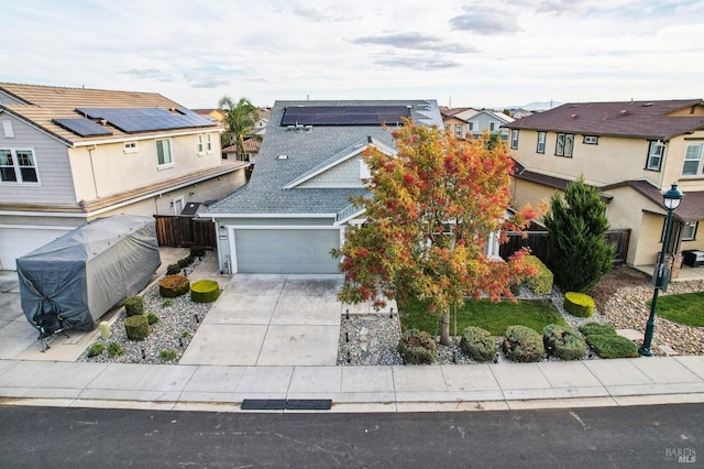 front of property with a garage