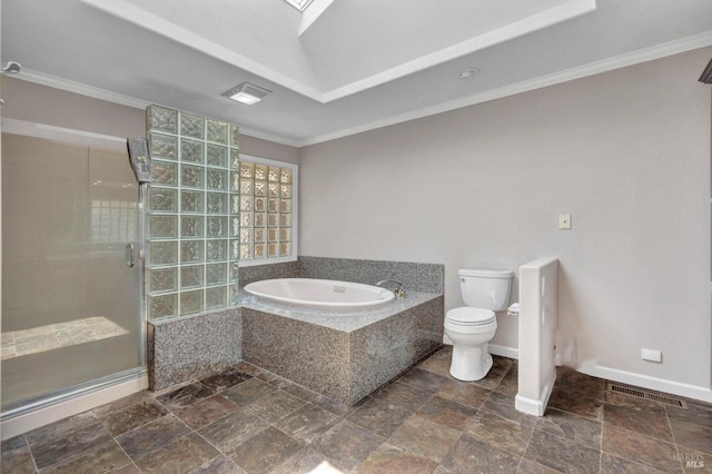 full bath featuring toilet, a skylight, visible vents, a bath, and a stall shower