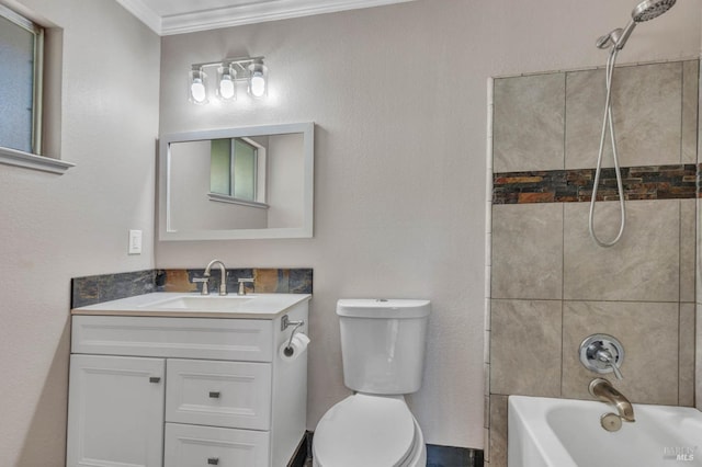 full bathroom featuring ornamental molding, tub / shower combination, vanity, and toilet