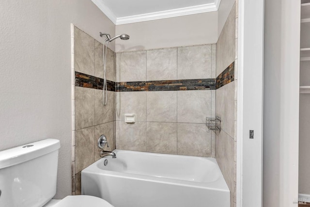 bathroom with  shower combination, ornamental molding, and toilet