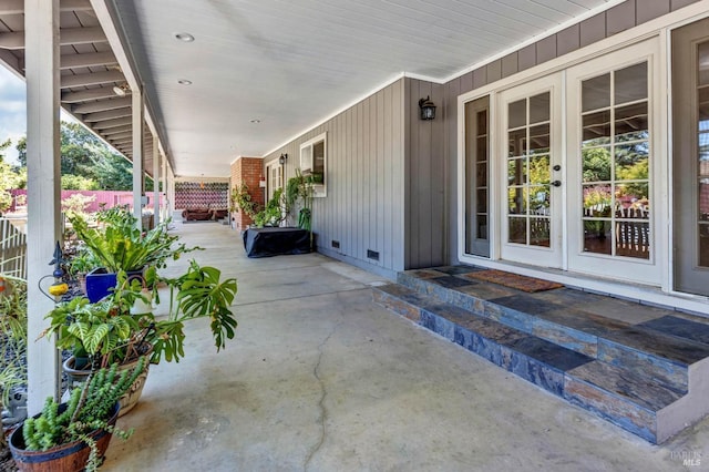 view of patio / terrace featuring french doors