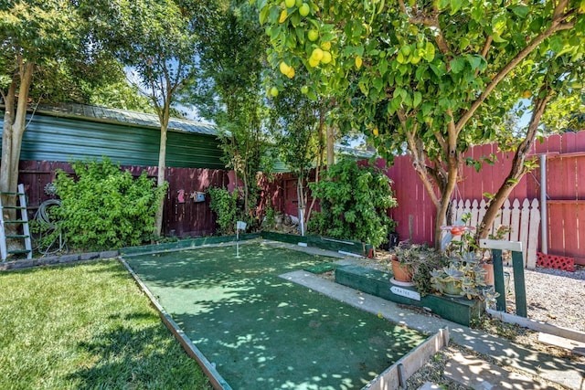 view of yard featuring a fenced backyard