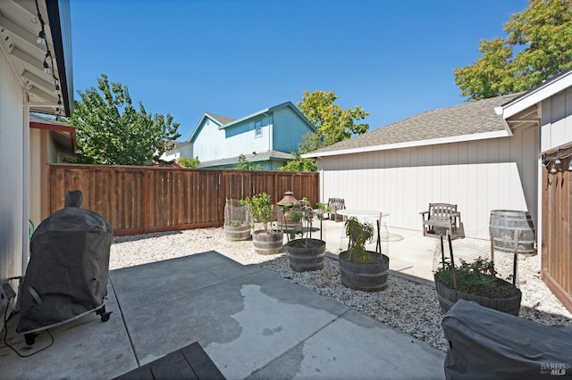 view of patio / terrace with a grill