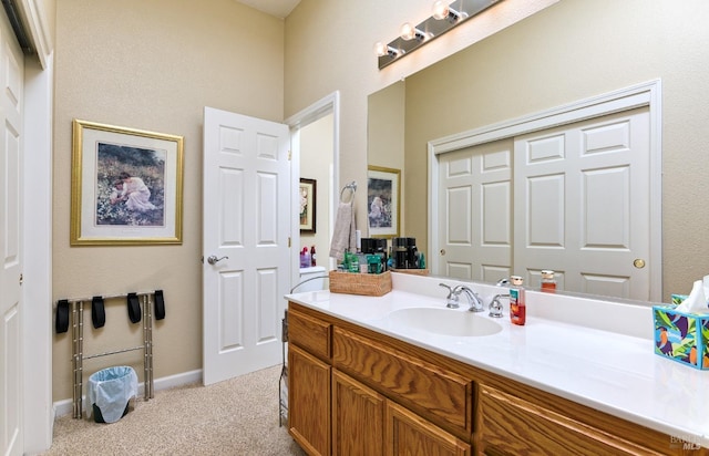 bathroom featuring vanity and baseboards