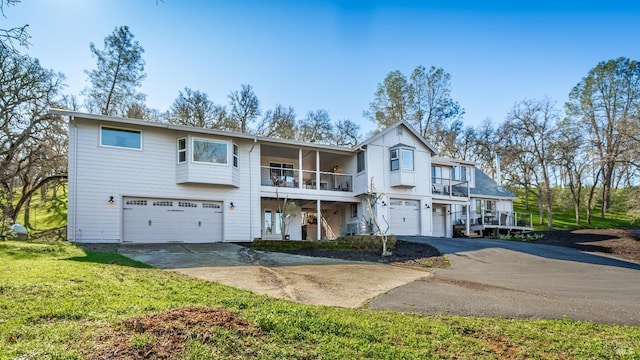 1061 Steele Canyon Rd, Napa, CA 94558 - view of front facade with a garage, driveway, and a balcony