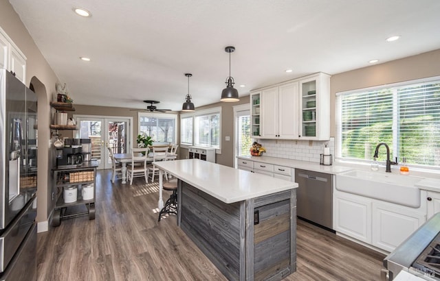 1061 Steele Canyon Rd, Napa, CA 94558 - kitchen featuring light countertops, backsplash, stainless steel dishwasher, fridge with ice dispenser, and a sink