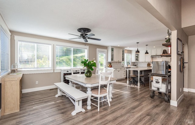1061 Steele Canyon Rd, Napa, CA 94558 - dining area with ceiling fan, dark wood-type flooring, and baseboards