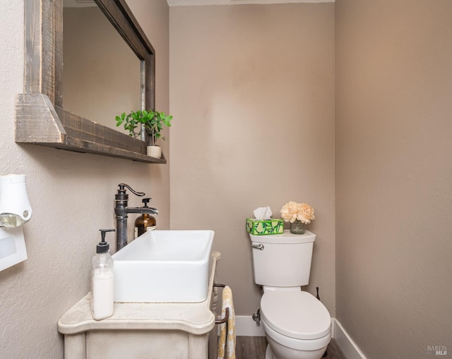 1061 Steele Canyon Rd, Napa, CA 94558 - bathroom with a sink, toilet, and baseboards