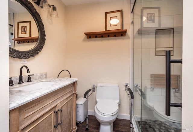 1061 Steele Canyon Rd, Napa, CA 94558 - bathroom with toilet, a shower stall, vanity, wood finished floors, and baseboards