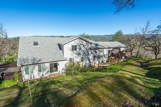 1061 Steele Canyon Rd, Napa, CA 94558 - rear view of house featuring roof with shingles and a yard
