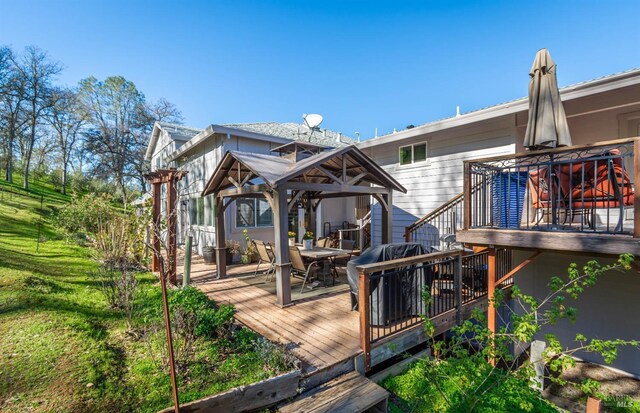 1061 Steele Canyon Rd, Napa, CA 94558 - wooden terrace with outdoor dining area and a gazebo