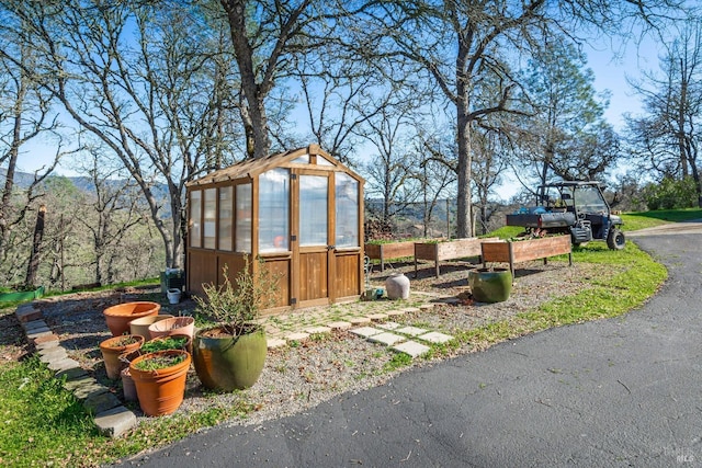 1061 Steele Canyon Rd, Napa, CA 94558 - view of yard featuring a greenhouse and an outbuilding