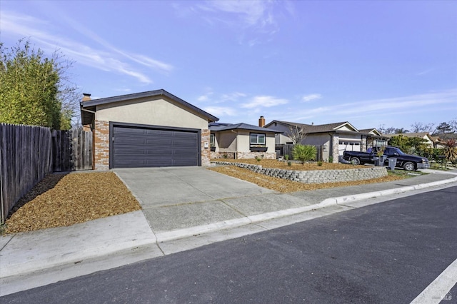 ranch-style home with a garage