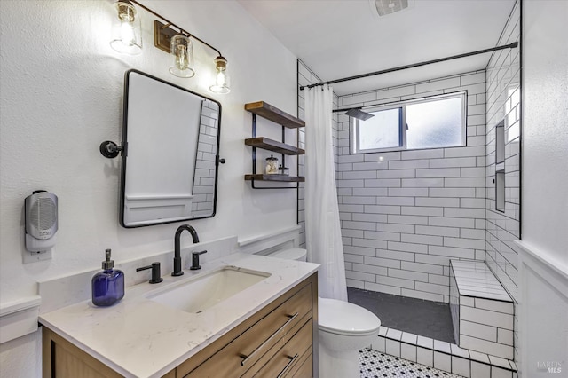 bathroom featuring vanity, a shower with curtain, and toilet