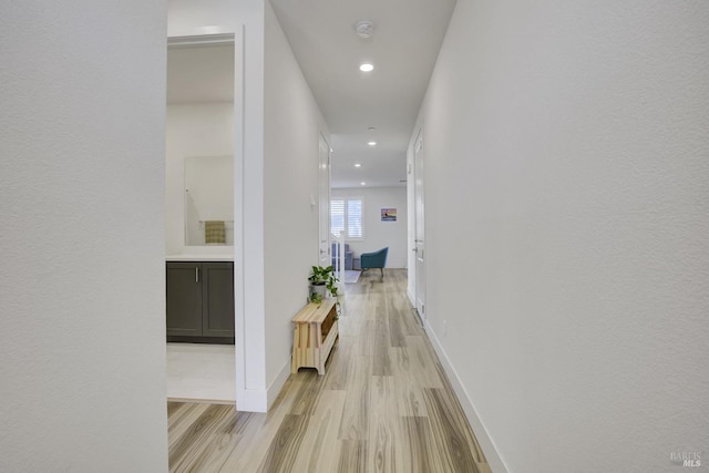 hallway featuring light hardwood / wood-style floors