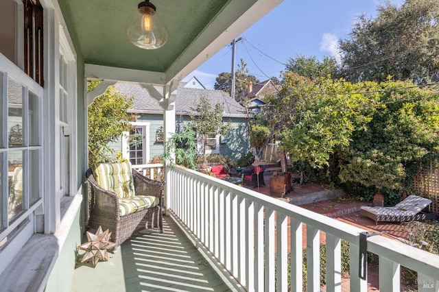 balcony featuring a porch