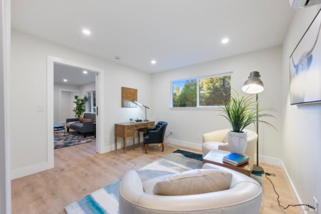 sitting room featuring light wood-type flooring