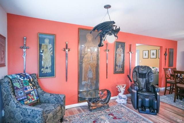 sitting room featuring hardwood / wood-style floors