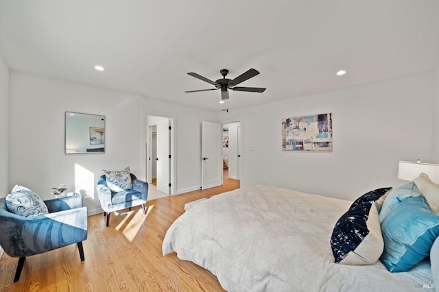 bedroom with recessed lighting, ceiling fan, and light wood-style flooring