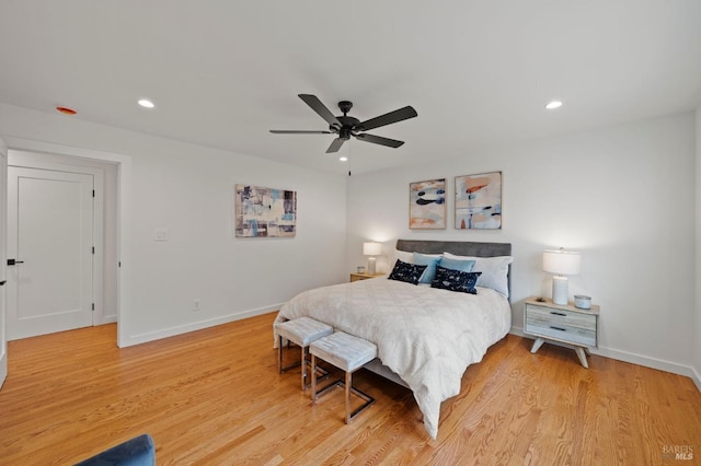 bedroom featuring light wood-style floors, baseboards, and recessed lighting