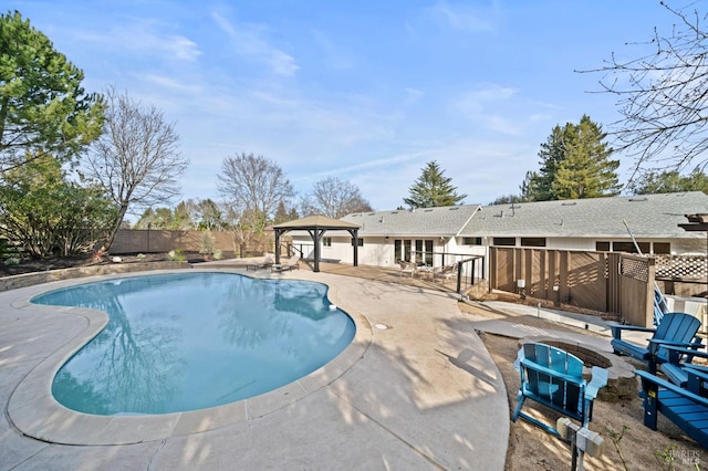 view of pool with a gazebo, a patio, fence, and a fenced in pool