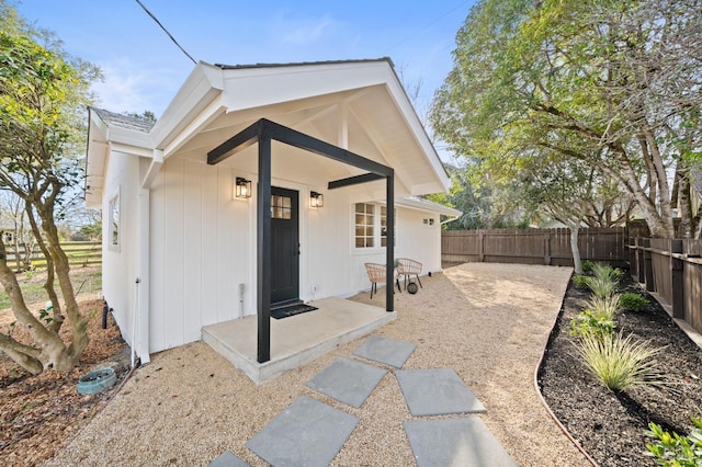 exterior space with a patio and a fenced backyard