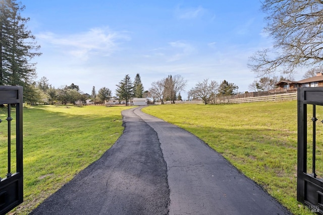 view of road featuring aphalt driveway