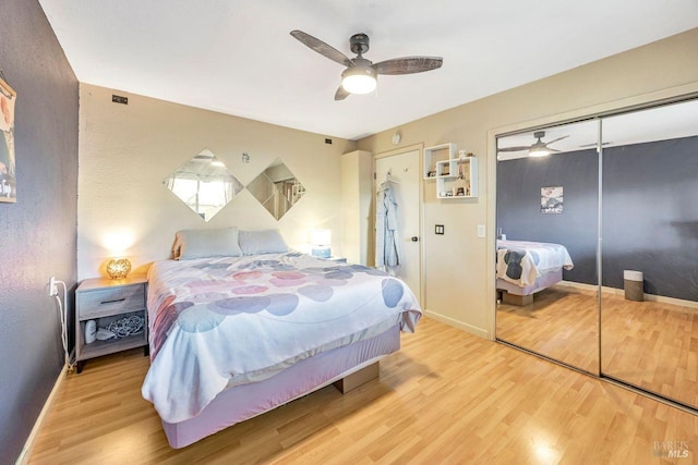 bedroom featuring ceiling fan and light wood-type flooring