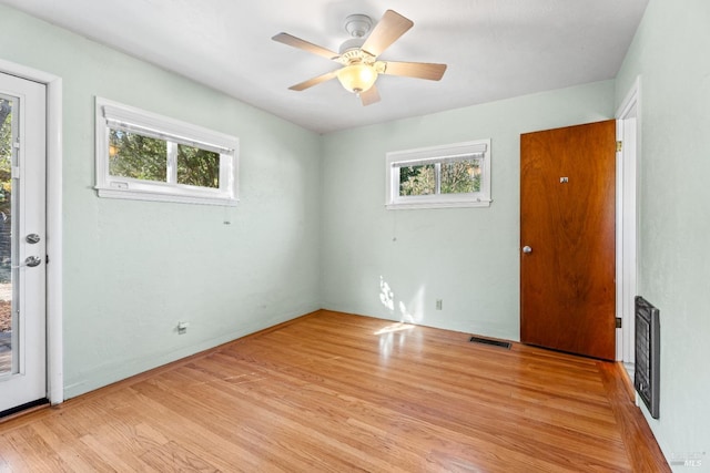 unfurnished room featuring light hardwood / wood-style floors and ceiling fan