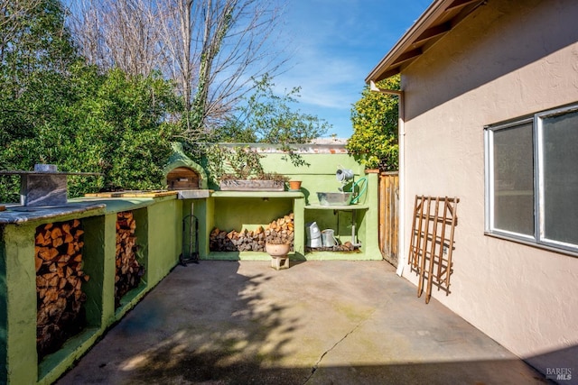 view of patio with exterior kitchen