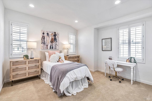 bedroom with light carpet, multiple windows, lofted ceiling, and recessed lighting