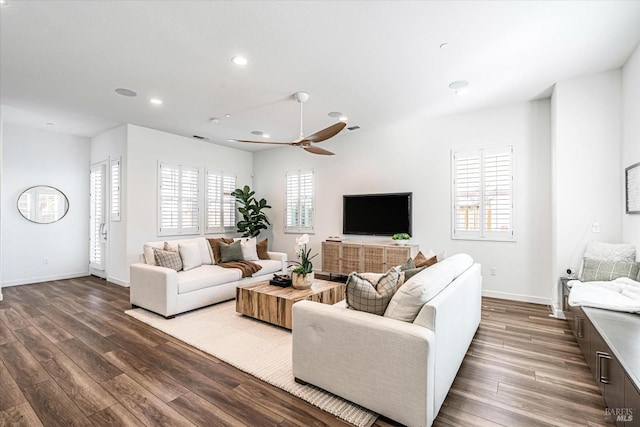 living area featuring recessed lighting, ceiling fan, baseboards, and wood finished floors