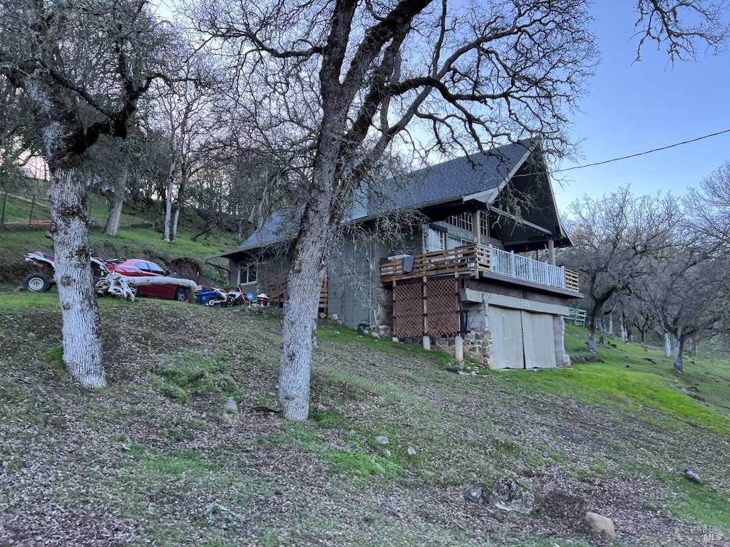 view of yard with a deck