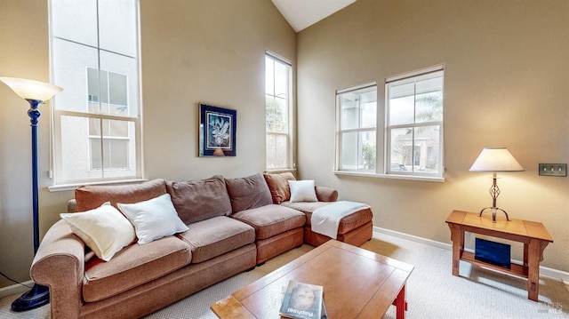 living room with light carpet and lofted ceiling