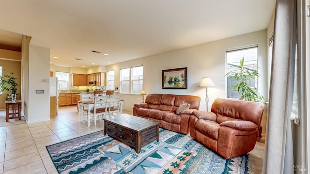 living room featuring light tile patterned flooring